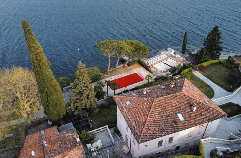 One of his villas at Lake Como in Italy. In April 2022, activists entered the property and dyed the swimming pool red. 